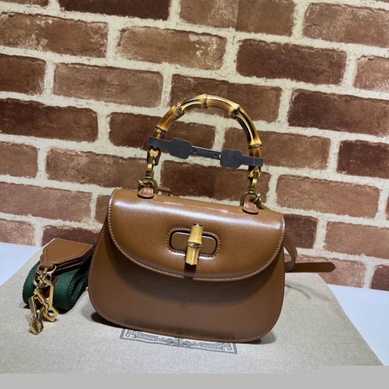 G*u*i top handle bags